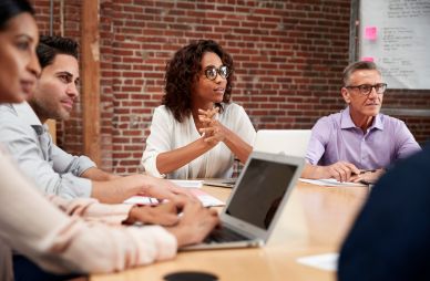 A team having a meeting at a table.